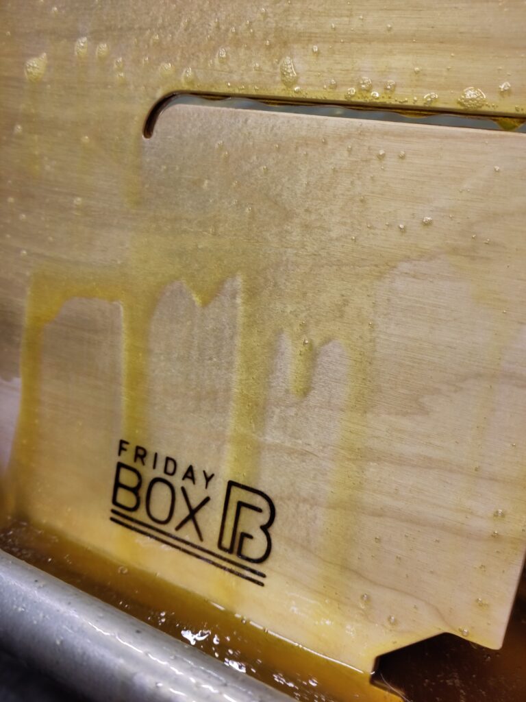 side part of our foldable wooden box is layered with linseed oil